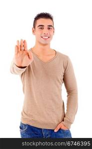 Studio shot of a young man signaling stop - isolated