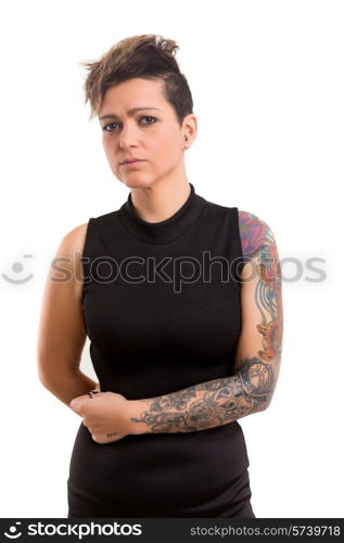 Studio shot of a young tattooed woman