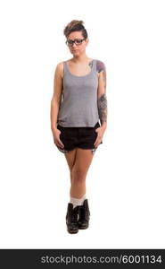 Studio shot of a young tattooed woman