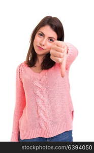 Studio shot of a young woman signaling thumbs down