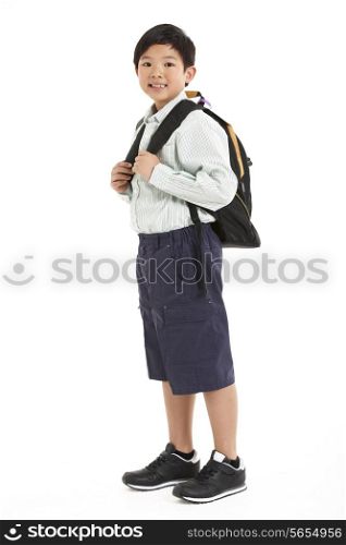Studio Shot Of Chinese Boy In School Uniform
