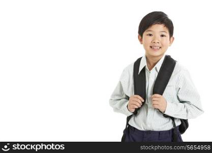 Studio Shot Of Chinese Boy In School Uniform