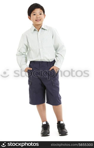 Studio Shot Of Chinese Boy In School Uniform