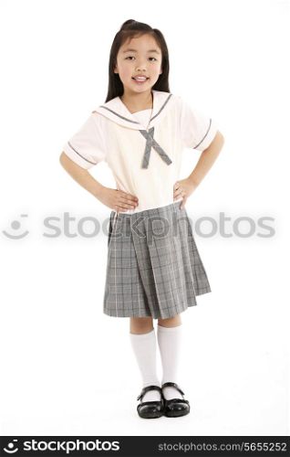 Studio Shot Of Chinese Girl In School Uniform