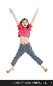Studio Shot Of Chinese Girl Jumping In Air