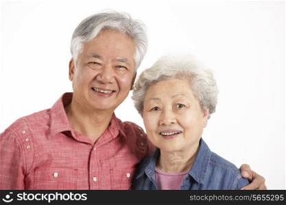 Studio Shot Of Chinese Senior Couple