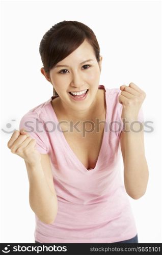 Studio Shot Of Excited Chinese Woman Celebrating