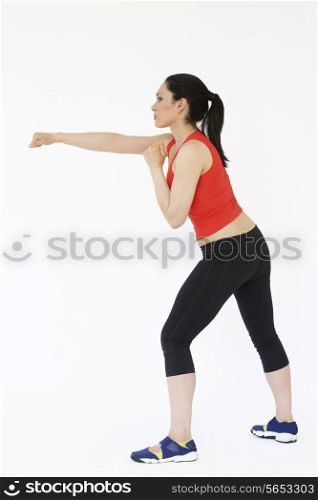 Studio Shot Of Exercising Woman