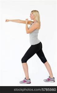 Studio Shot Of Exercising Woman