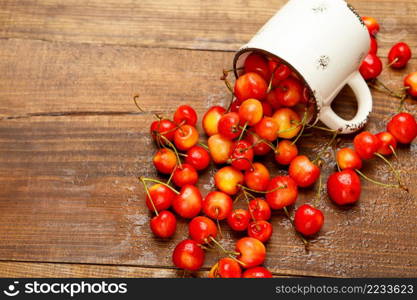 Studio shot of fresh natural cherries on wooden background. Studio shot of Fresh cherries