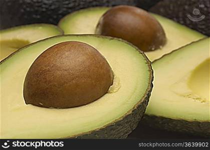 Studio shot of halved avocados