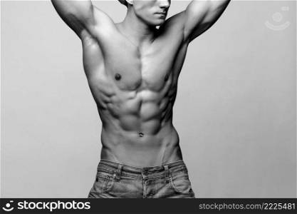 Studio shot of Handsome young man’s torso. Handsome young man’s torso