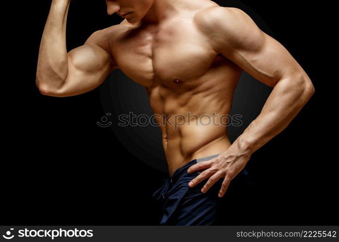 Studio shot of Handsome young man’s torso. Handsome young man’s torso