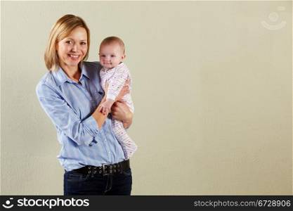 Studio Shot Of Happy Mother and Baby