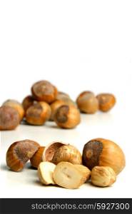 Studio shot of hazelnuts at white background