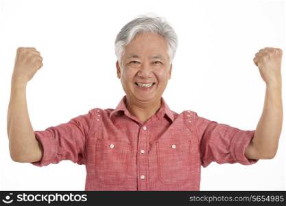 Studio Shot Of Jubilant Chinese Senior Man