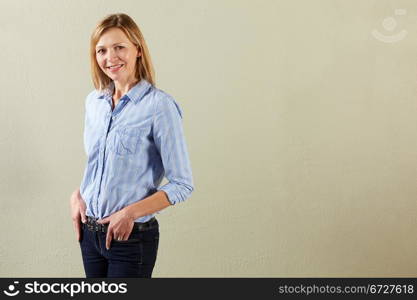 Studio Shot Of Relaxed Middle Aged Woman