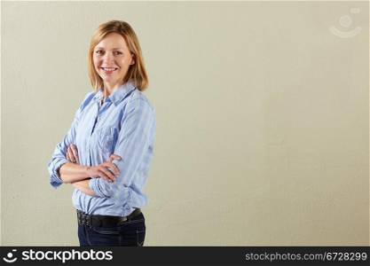 Studio Shot Of Relaxed Middle Aged Woman