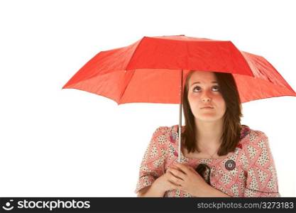 Studio Shot Of Teenage Girl Standing Under Red Umbrella