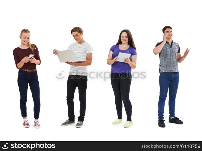 Studio Shot Of Teenagers Using Communication Technology