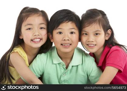 Studio Shot Of Three Chinese Children