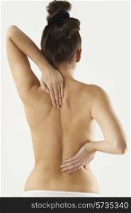 Studio Shot Of Woman With Painful Back