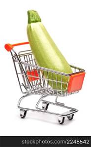 Studio shot of zucchini marrow in shopping cart isolated on white background. High quality photo. Studio shot of zucchini marrow in shopping cart isolated on white background