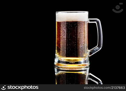 Studio shoy of Mug with beer on dark background.. Studio shoy of Mug with beer on dark background