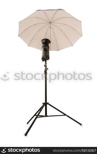 Studio strobe with umbrella isolated on the white