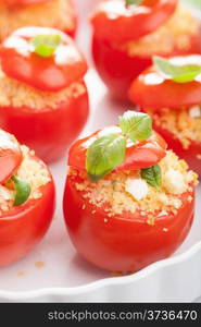 stuffed baked tomatoes with couscous and feta