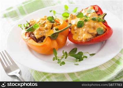 stuffed colorful peppers with meat cheese vegetables