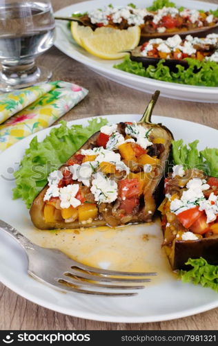 Stuffed eggplant with ricotta and vegetables in lettuce
