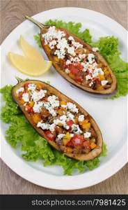 Stuffed eggplant with ricotta and vegetables in lettuce