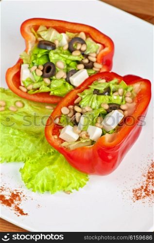 Stuffed peppers roasted with feta cheese . Stuffed peppers roasted with feta cheese and vegetable