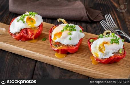 Stuffed peppers with mince meat topped with poached eggs