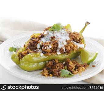 Stuffed Poblano Pepper with Dried Currants and Pine Nuts on a Plate