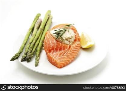 Stuffed salmon with green asparagus on the side