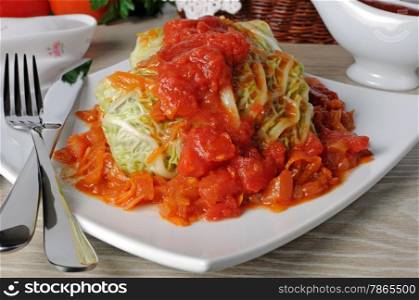 stuffed savoy cabbage under onion-carrot gravy