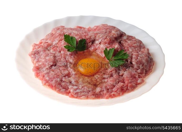 stuffing with egg in plate isolated on white. Preparation of the meat rissoles