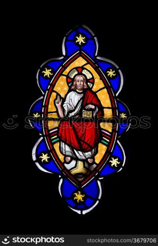 Stunning 15th Century stained glass window detail with vibrant colors and excellent detail of resurrected Jesus