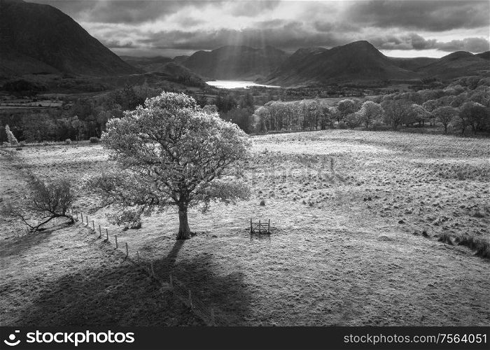 Stunning aerial drone Autumn Fall landscape image of view from Low Fell in Lake District looking towards Crummock Water and Mellbreak and Grasmoor peaks