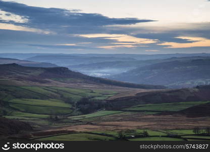 Stunning Autumn Fall landscape of Hope Valley from Stanage Edge in Peak District