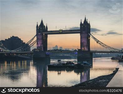 Stunning Autumn Fall sunrise over Tower Bridge and River Thames in London.