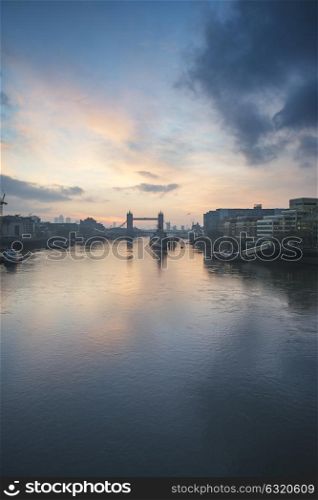 Stunning Autumn sunrise over River Thames and Tower Bridge in London