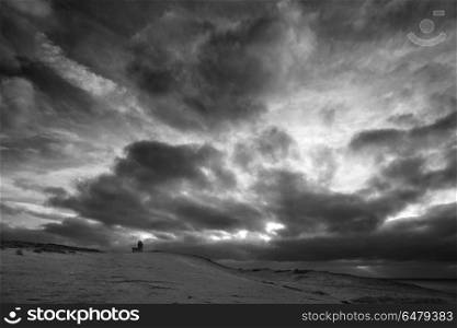 Stunning black and white landscape image of Belle Tout lighthous. Beautiful black and white landscape image of Belle Tout lighthouse on South Downs National Park during stormy sky