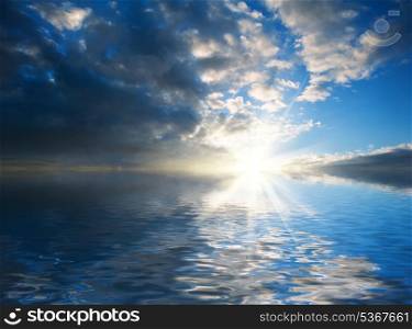 Stunning blue sky reflected in ocean giving inspirational image