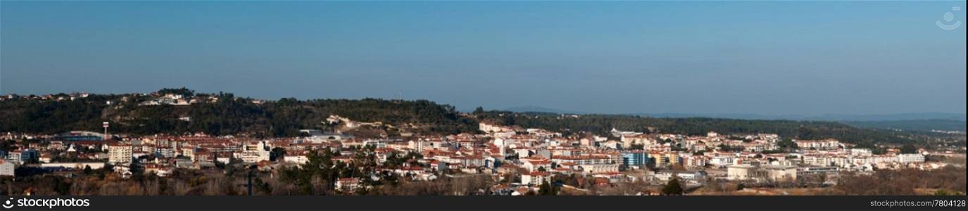 stunning cityscape view of Ourem in Portugal (panoramic picture with blue sky)