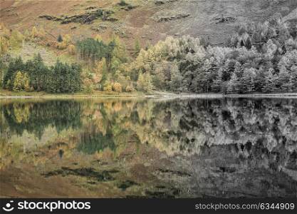 Stunning conceptual Autumn Fall landscape image of Lake Buttermere in Lake District England