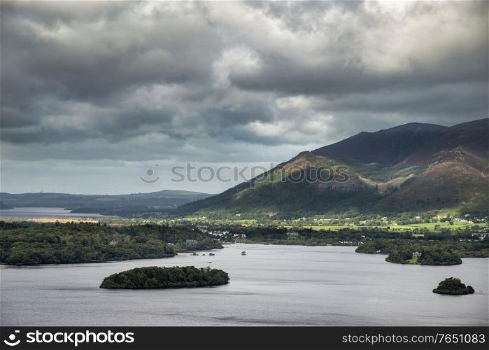 Stunning dramatic landscape image of view from Surprise View viewpoint in the Lake District overlooking Derwentwater with Skiddaw and Grisedale Pike in the distance