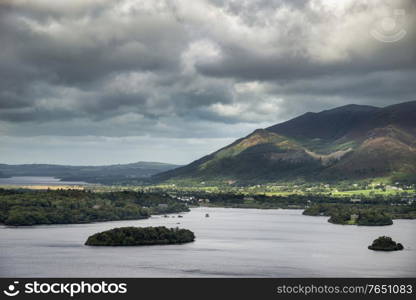 Stunning dramatic landscape image of view from Surprise View viewpoint in the Lake District overlooking Derwentwater with Skiddaw and Grisedale Pike in the distance